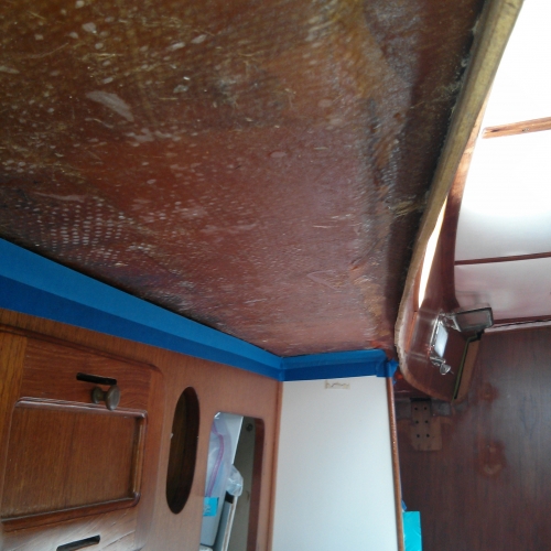 Prepping underside of deck in galley for painting