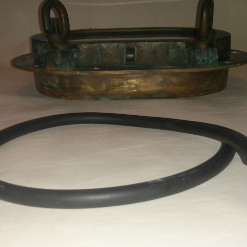 SOLD - New 1/2" round gasket material with port in background