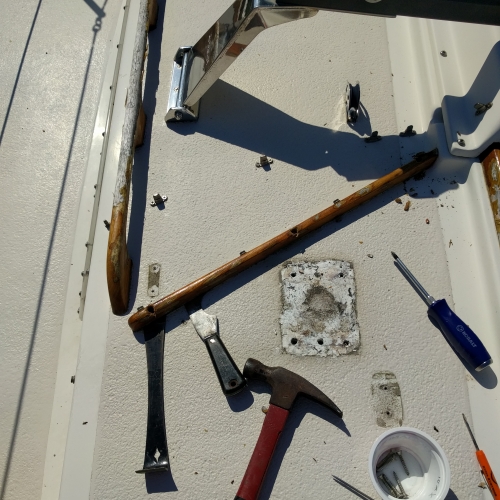 Removing hardware from cabin top