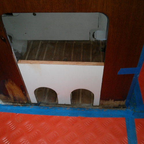Test fitting "mouse holes" panel in galley