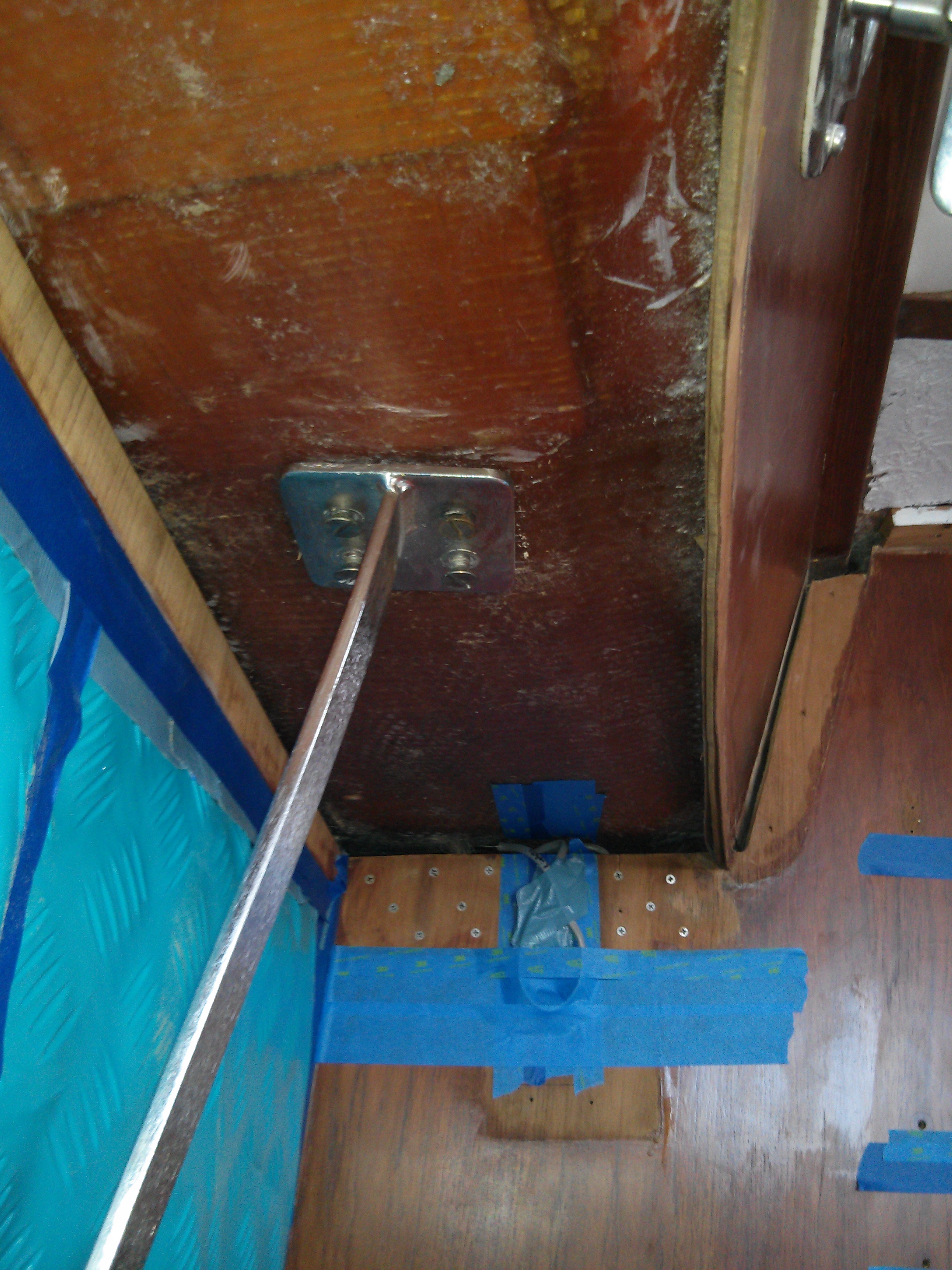port salon overhead sanded and ready for new tabbing along bulkhead and above cabinets